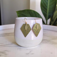 Boucles d'oreilles, Alix Karmyliege